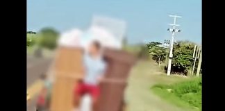 ASSISTA: Homem é flagrado pendurado em carro de mudança na rodovia Júlio Budiski